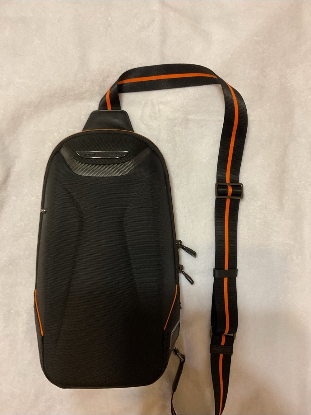 Tumi Black Sling Belt Bag with Orange Stripe